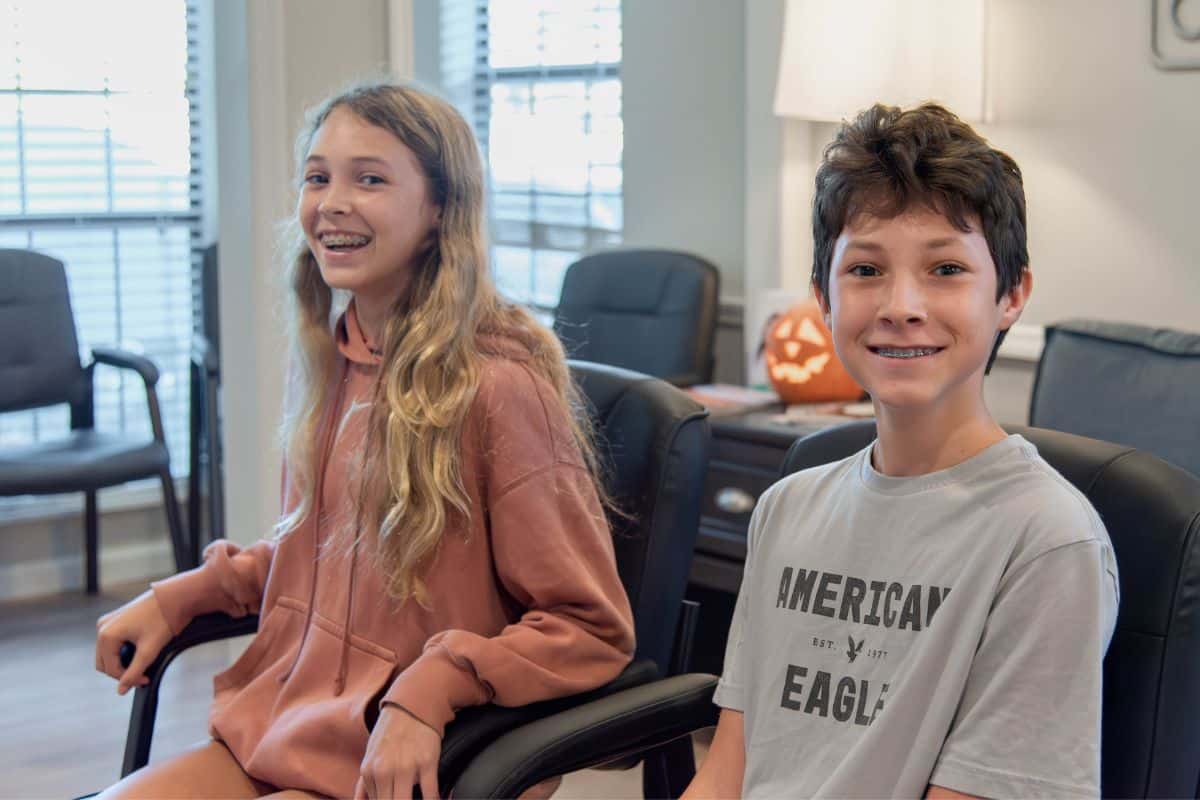 Grosso-orthodontics-virtual-consultation Kids smiling during a virtual orthodontic consultation with grosso orthodontics in south carolina