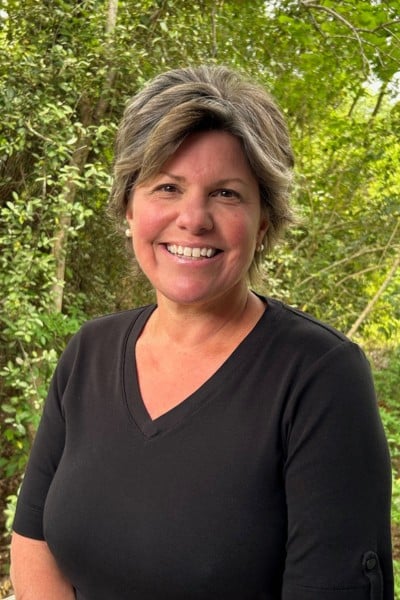 Grosso-orthodontics-denise-schedule-coordinator Friendly team member smiling outdoors at grosso orthodontics in south carolina