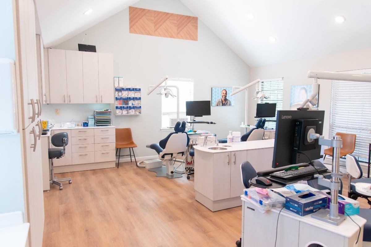 Grosso-orthodontics-moncks-corner-treatment-area-hardwood-floors Bright orthodontic treatment area at grosso orthodontics in moncks corner, sc for braces and invisalign patients.